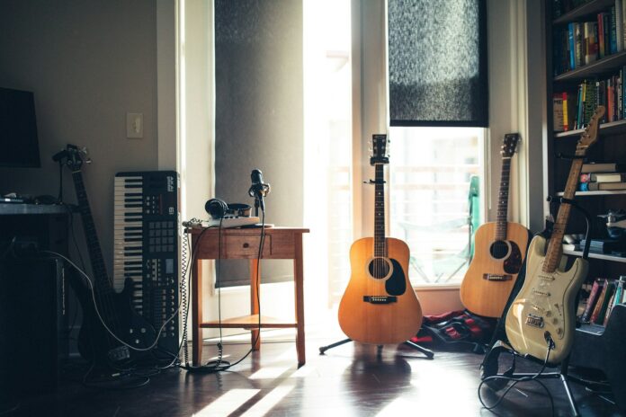 Photo by Wes Hicks several guitars beside of side table