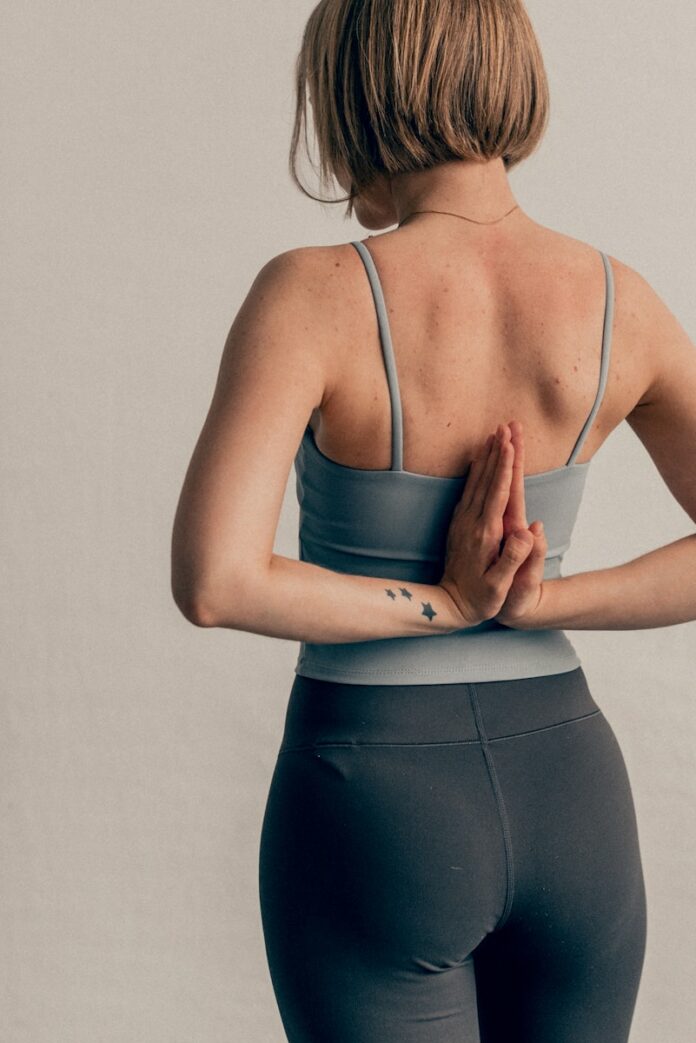 Photo by Alina Rubo a woman wearing a garment