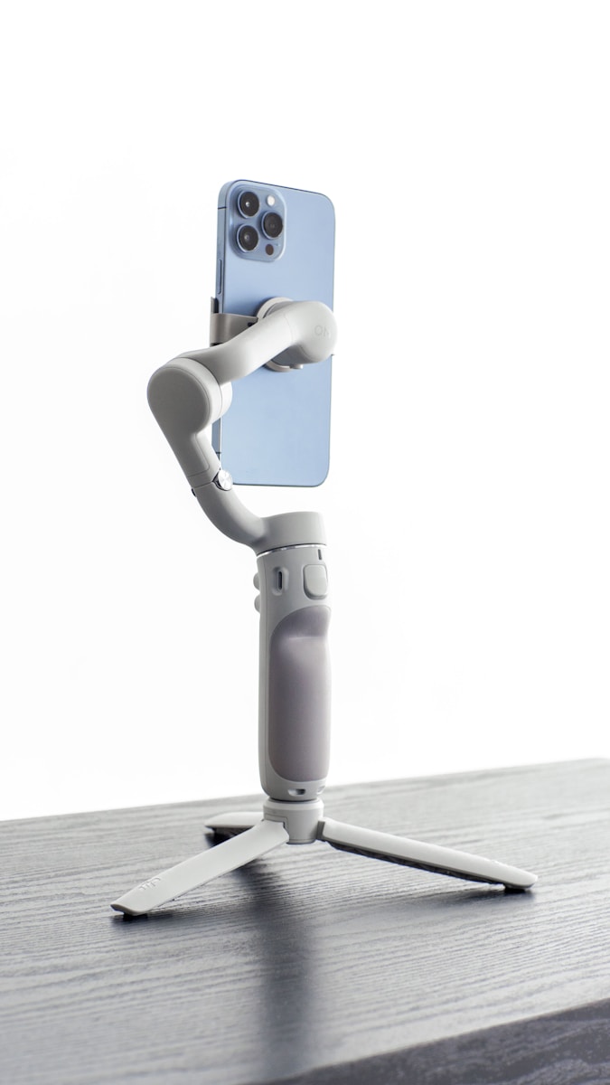 Photo by Alan Quirvan a silver robot with a gun