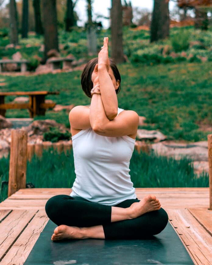 Photo by Erik Brolin woman performing yoga
