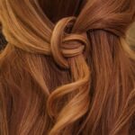 “건강한 모발, 일상 속 작은 습관에서 시작됩니다” brown hair on white textile